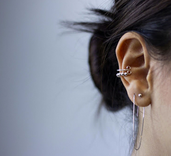 A person with ear piercings