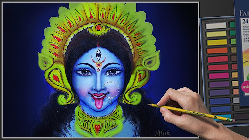 A hand drawing an image of the goddess Kali with a nose ring.