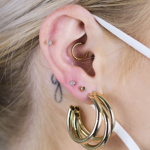 A person with ear piercings